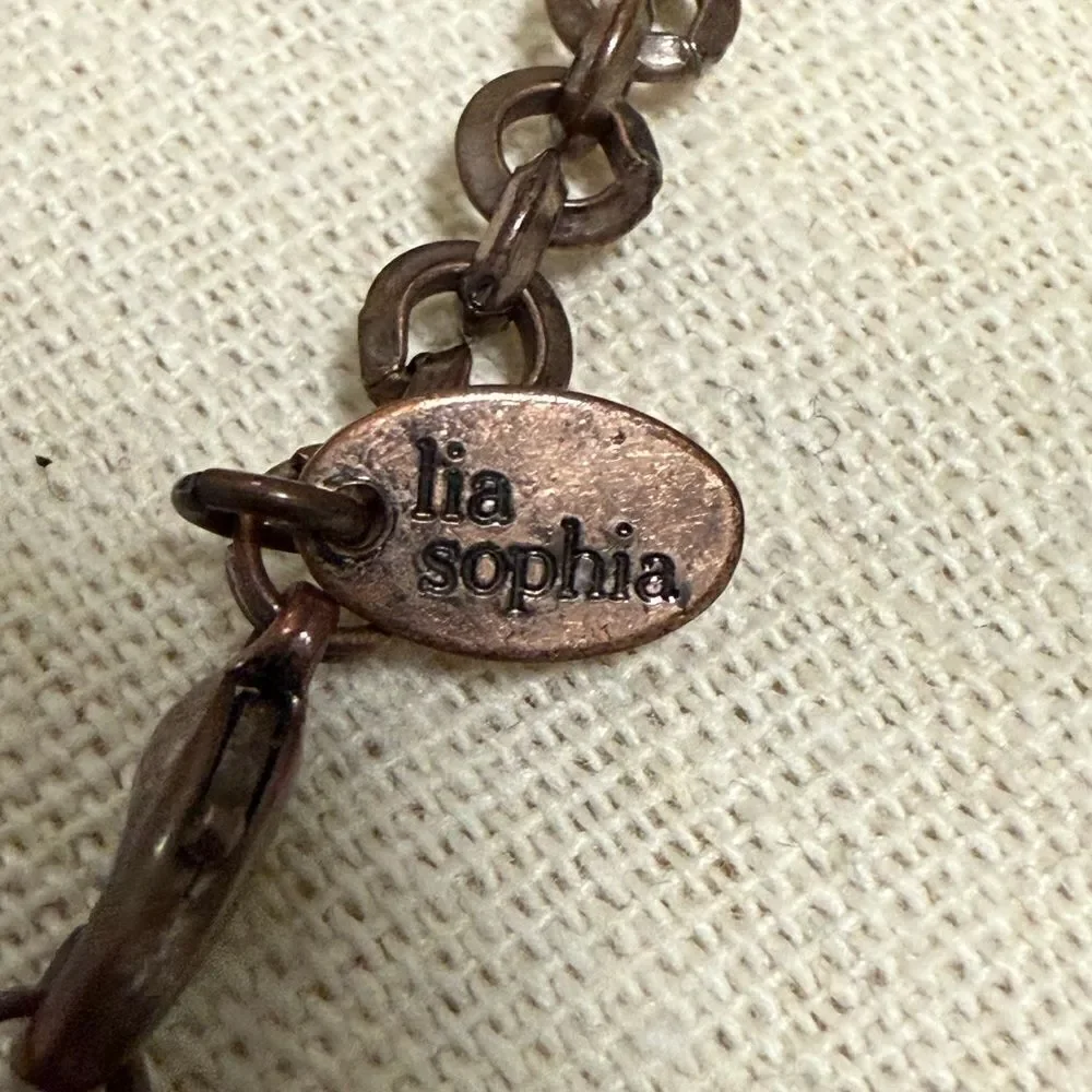 Lia Sophia Signed Bronze necklace with Abalone, Fresh Water Pearls and Charms.
